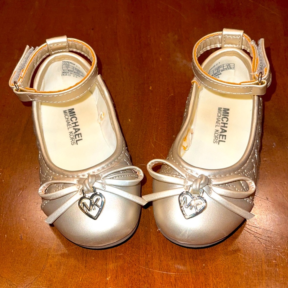 Gold ankle strap ballet shoe